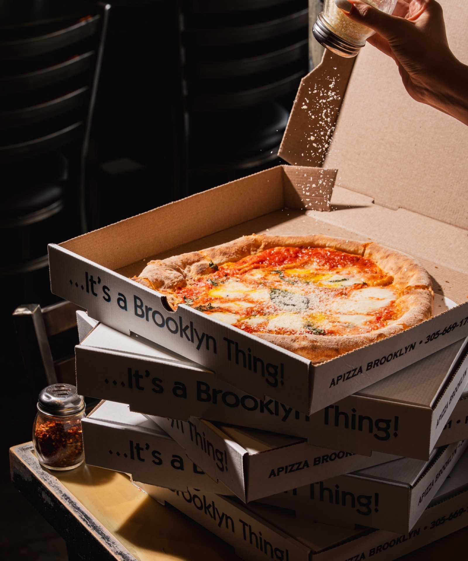 Apizza Brooklyn pizza with parmesan at Pinecrest